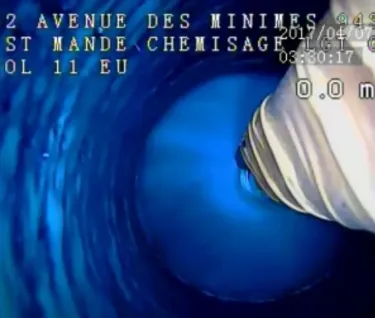 Application du chemisage Elastoflake dans une canalisation
